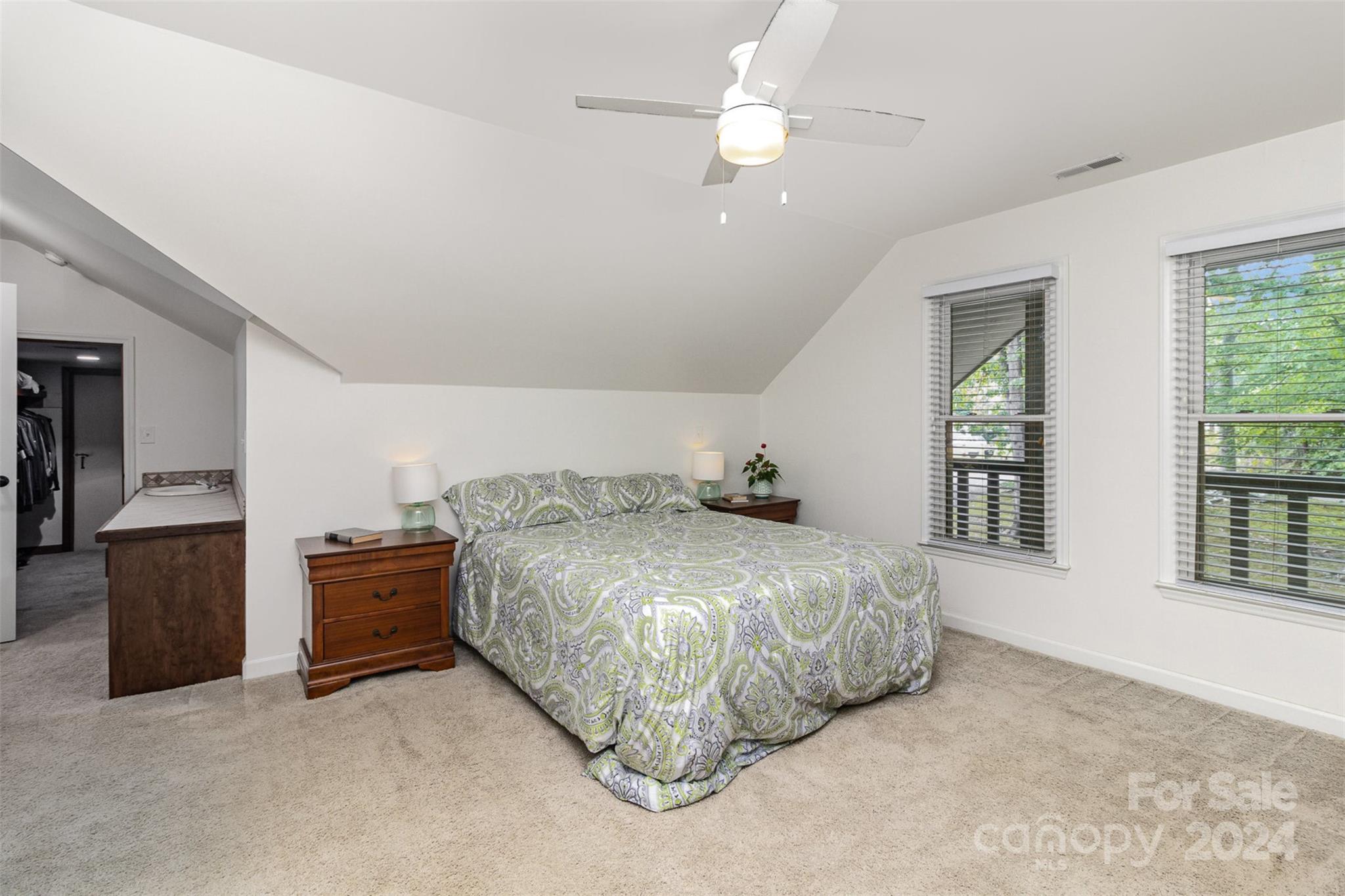 808 Dogwood Drive Lowell, NC 28098 - Photo 14 of 36 a spacious bedroom with a bed and a window