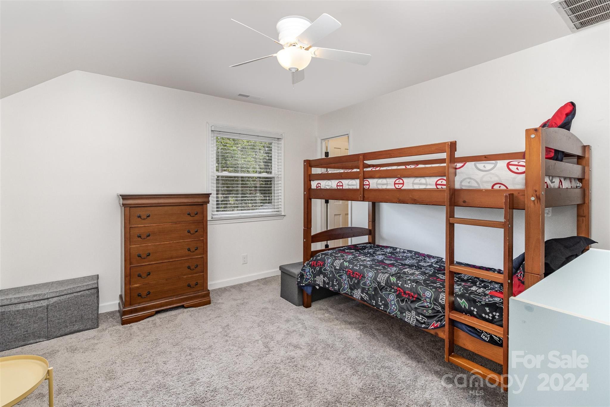 808 Dogwood Drive Lowell, NC 28098 - Photo 19 of 36 a bedroom with a bed and a closet