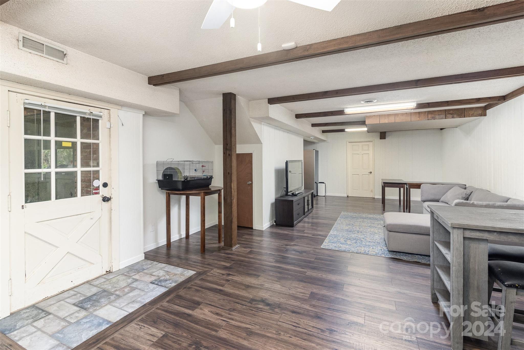 808 Dogwood Drive Lowell, NC 28098 - Photo 25 of 36 a living room with furniture and a fireplace