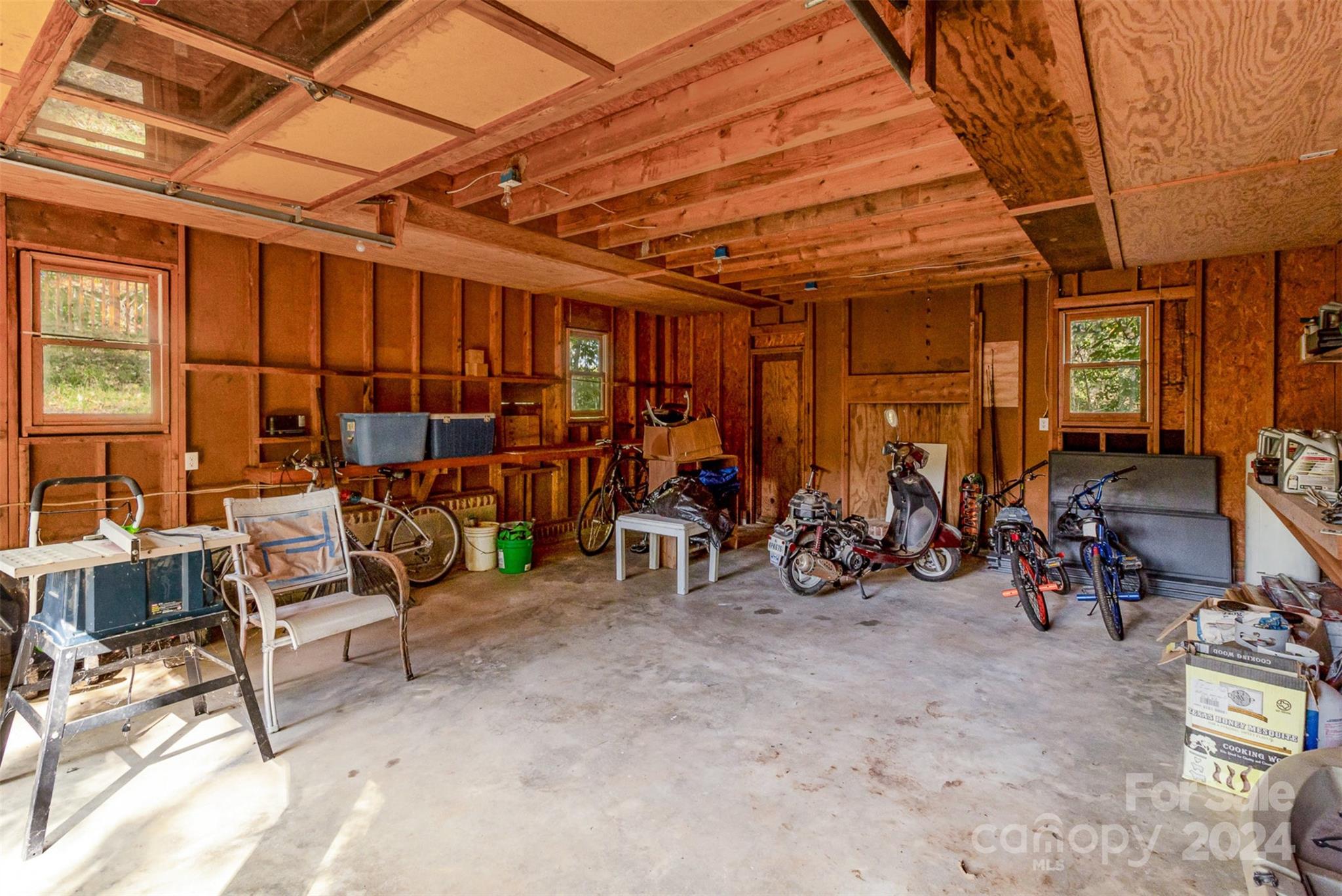 808 Dogwood Drive Lowell, NC 28098 - Photo 26 of 36 a view of a bike storage area