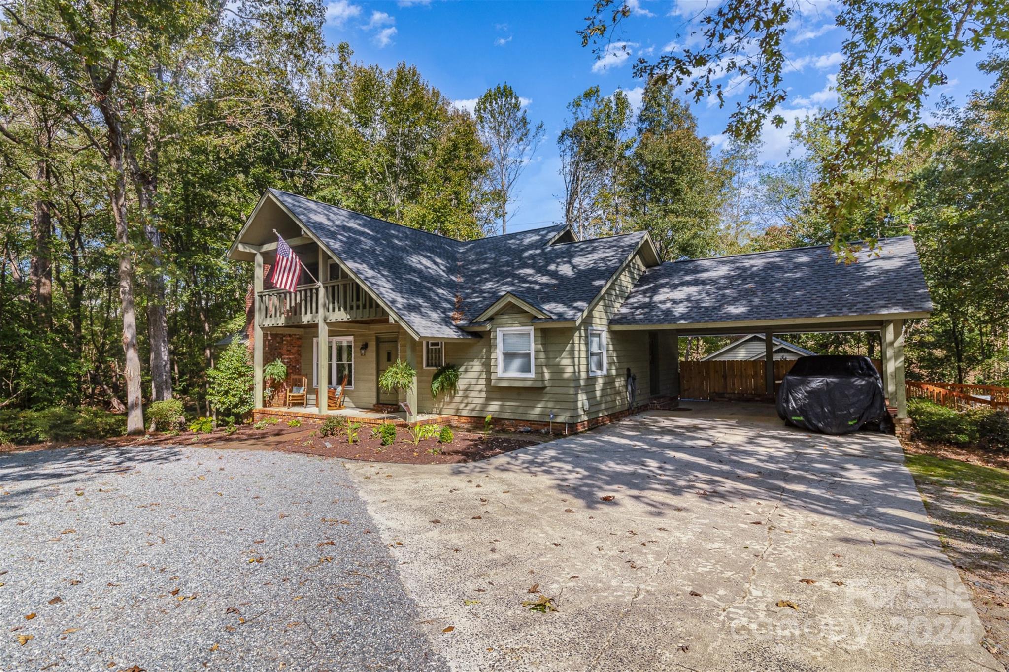 808 Dogwood Drive Lowell, NC 28098 - Photo 31 of 36 a front view of a house with a yard