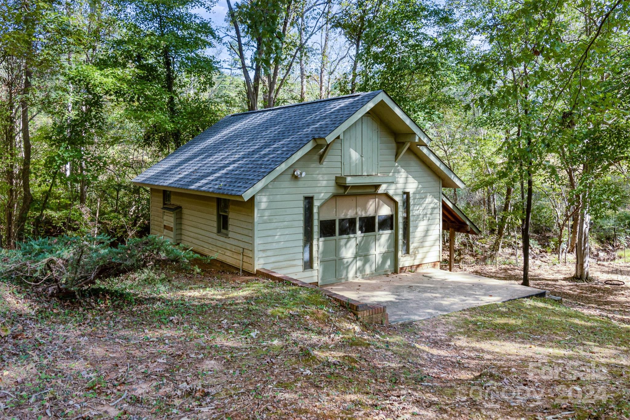 808 Dogwood Drive Lowell, NC 28098 - Photo 32 of 36 a front view of a house with a yard