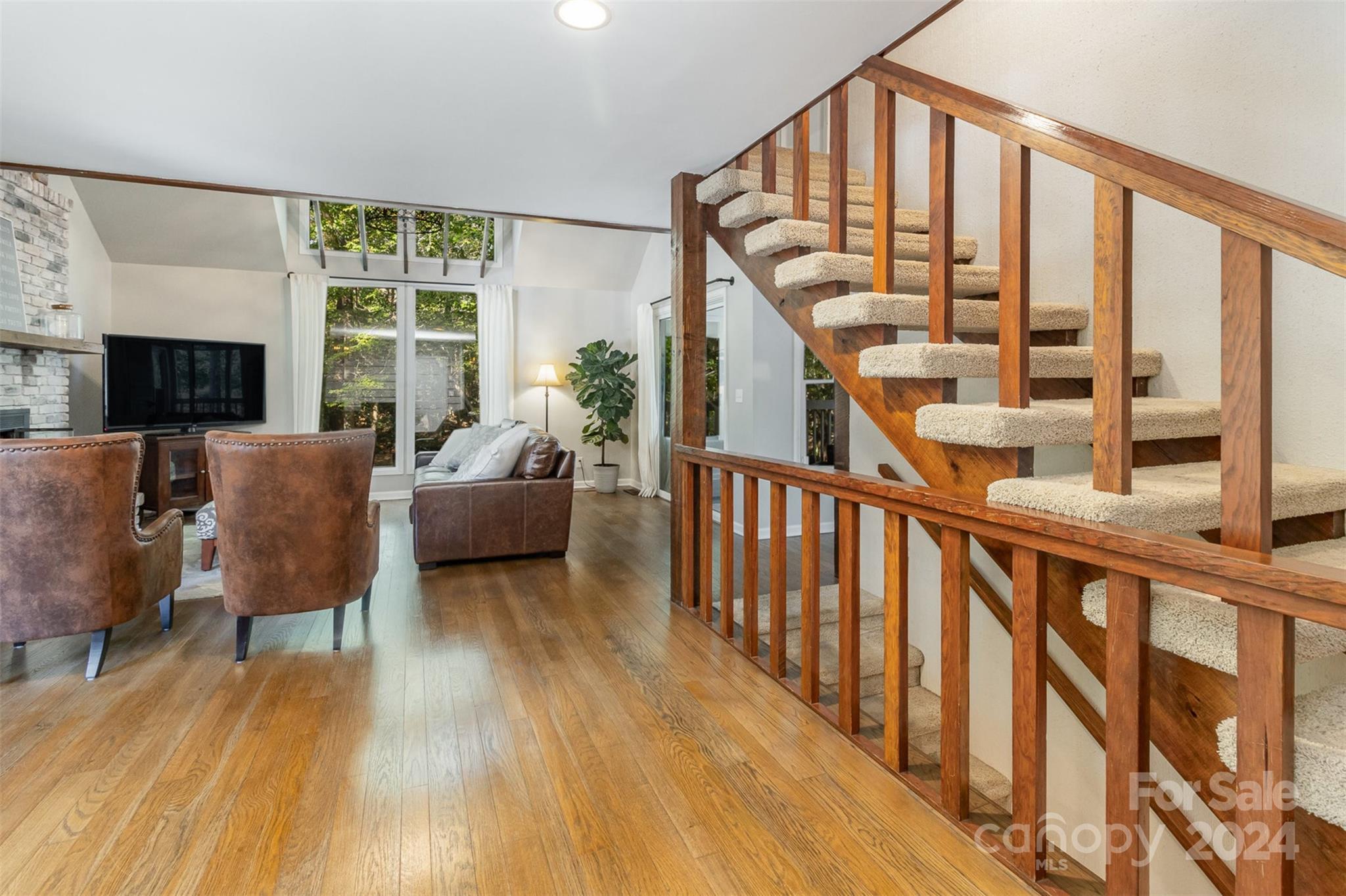 808 Dogwood Drive Lowell, NC 28098 - Photo 4 of 36 a living room with furniture and a large window