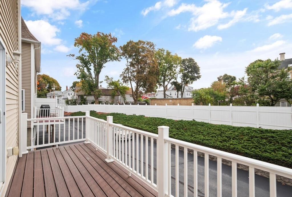 22 School Street, Unit 1 Waltham, MA 02452 - Photo 10 of 12 a view of a wooden deck