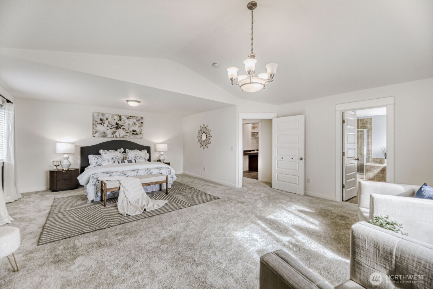 3626 222nd Place Southeast Bothell, WA 98021 - Photo 15 of 27 a spacious bedroom with a bed and ceiling fan