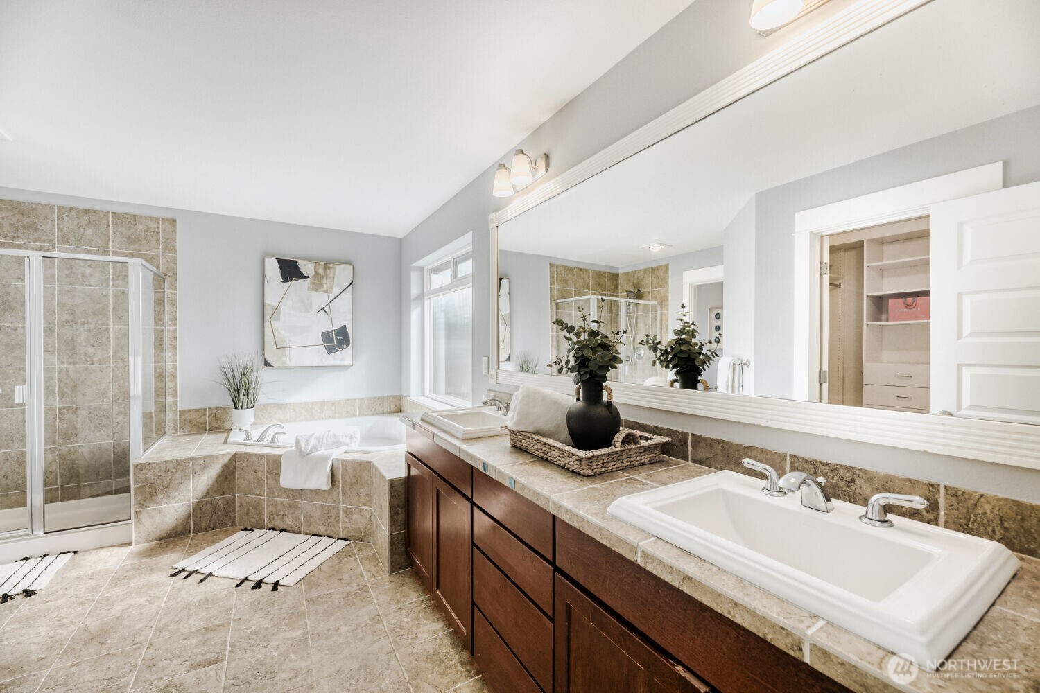 3626 222nd Place Southeast Bothell, WA 98021 - Photo 17 of 27 a bathroom with a granite countertop sink and a mirror