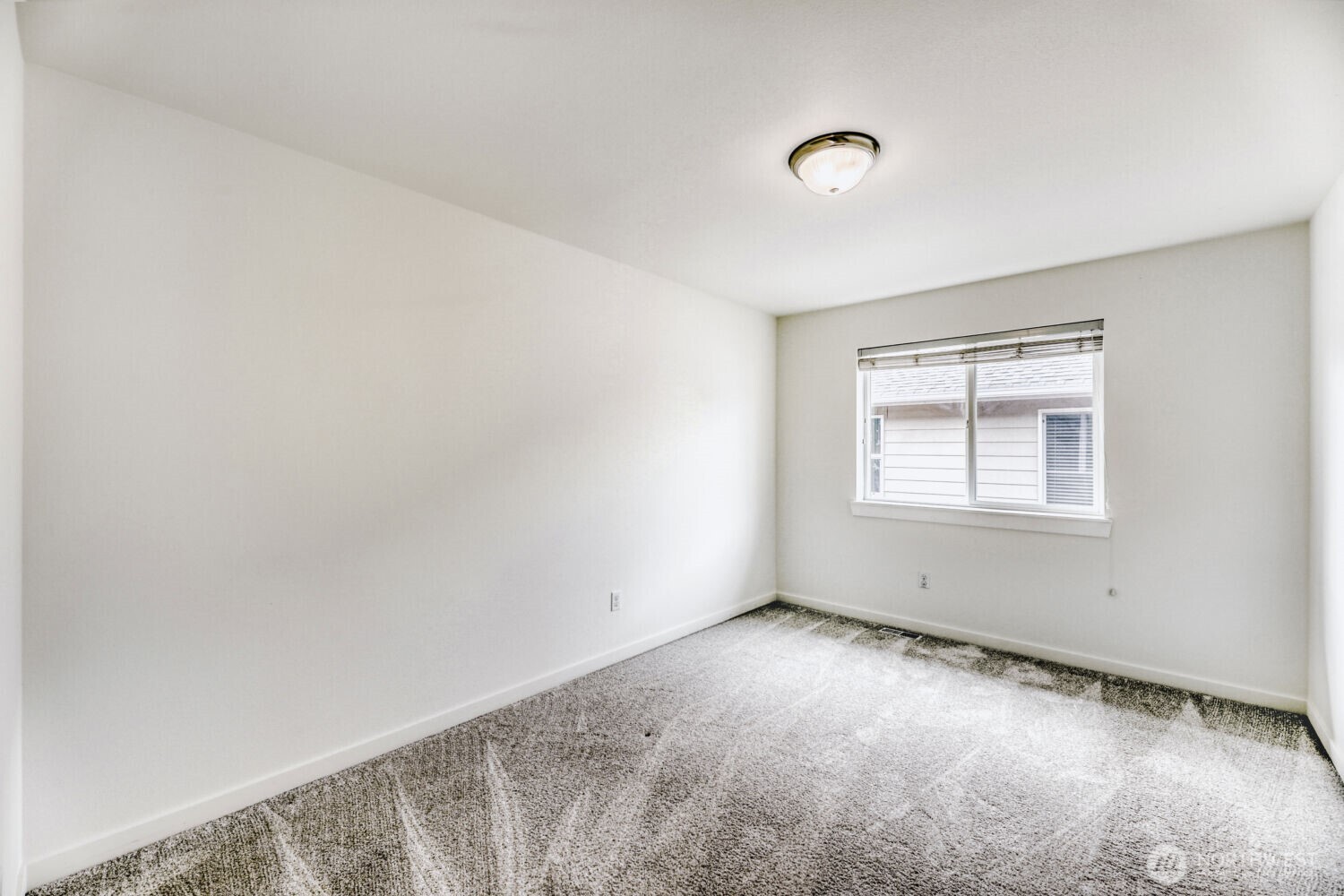 3626 222nd Place Southeast Bothell, WA 98021 - Photo 22 of 27 a view of an empty room with a window