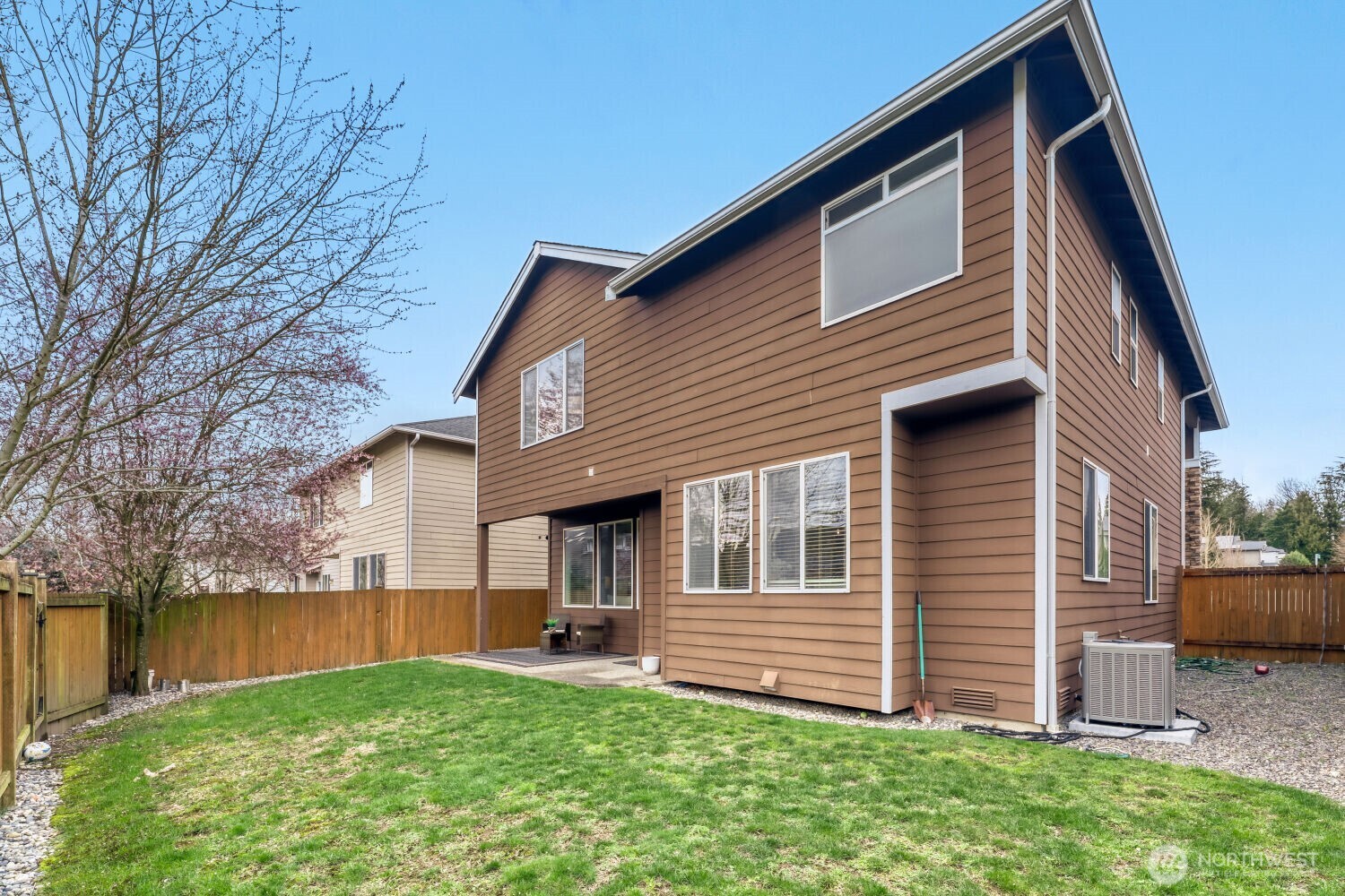 3626 222nd Place Southeast Bothell, WA 98021 - Photo 26 of 27 a view of backyard of house with green space