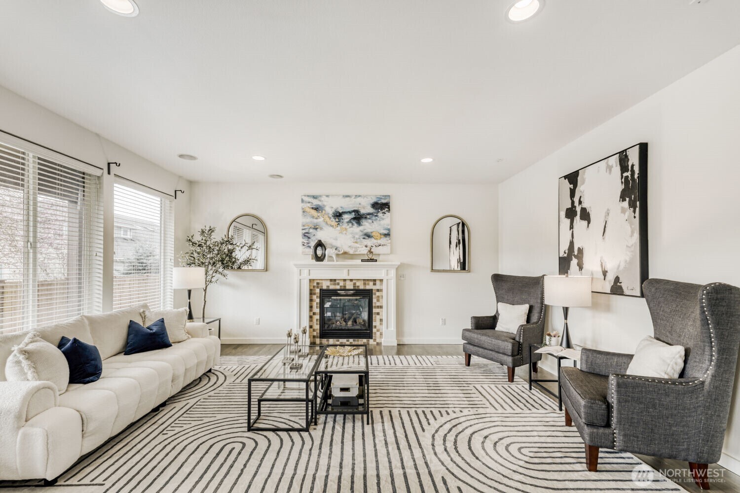 3626 222nd Place Southeast Bothell, WA 98021 - Photo 4 of 27 a living room with furniture and a fireplace