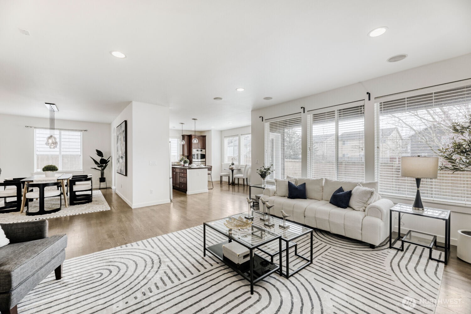 3626 222nd Place Southeast Bothell, WA 98021 - Photo 6 of 27 a living room with furniture wooden floor and a large window