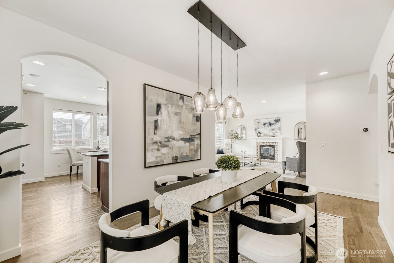 3626 222nd Place Southeast Bothell, WA 98021 - Photo 7 of 27 a view of a dining room with furniture and wooden floor