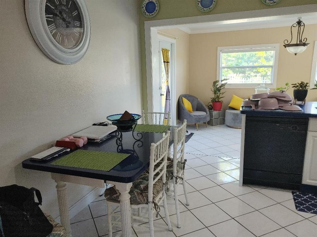 5004 Northwest 49th Road Tamarac, FL 33319 - Photo 5 of 16 a view of a livingroom with furniture and window