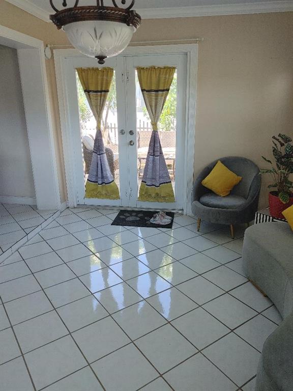 5004 Northwest 49th Road Tamarac, FL 33319 - Photo 7 of 16 a living room with a couch and a table