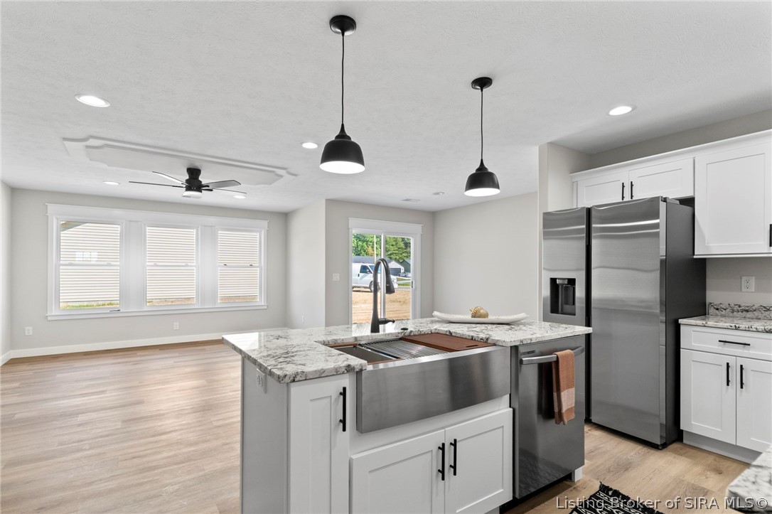 302 Garrison Street Hanover, IN 47243 - Photo 4 of 27 Great room and kitchen
