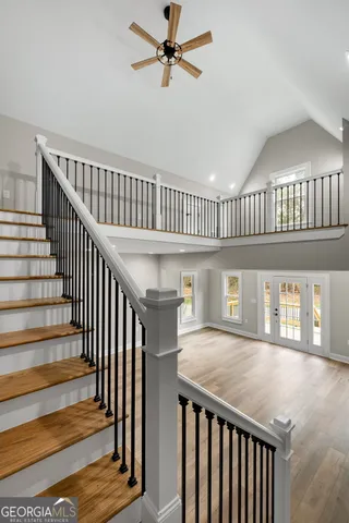 a view of entryway with wooden floor