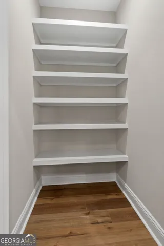 a view of a room with shelves