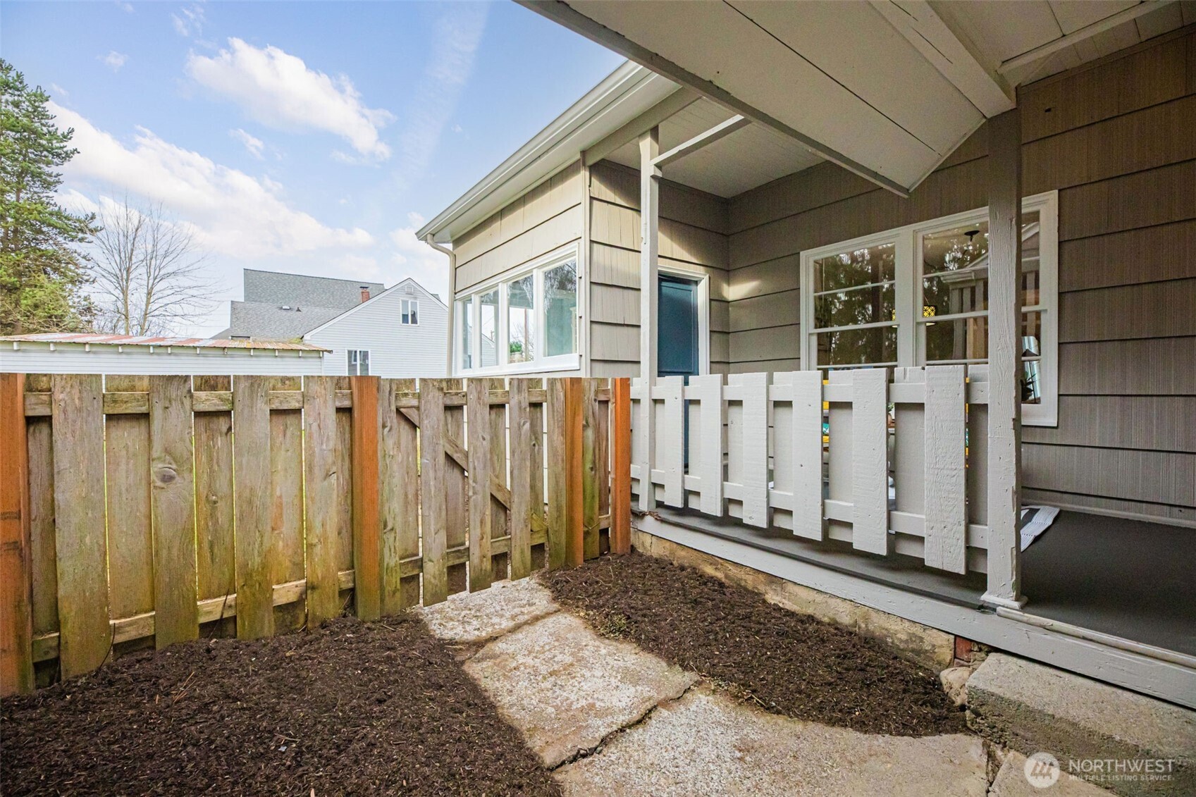 217 6th Street Snohomish, WA 98290 - Photo 29 of 40 a view of a house with a wooden fence