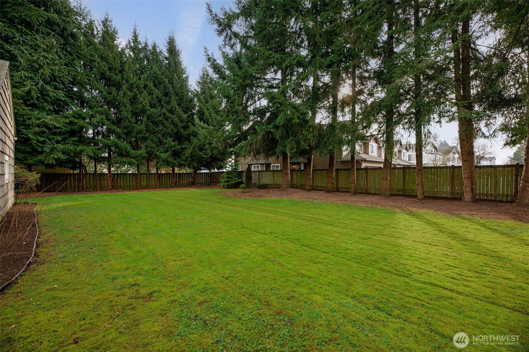 217 6th Street Snohomish, WA 98290 - Photo 35 of 40 a view of yard with trees in the background