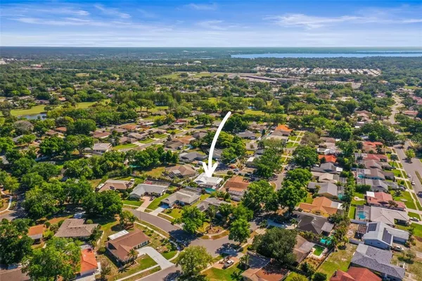 an aerial view of residential house with outdoor space