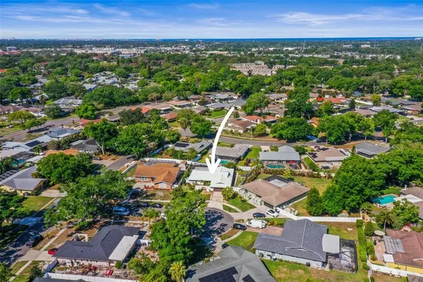 an aerial view of a city with lots of residential buildings