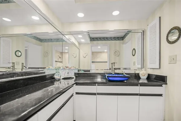 a kitchen with sink and stove