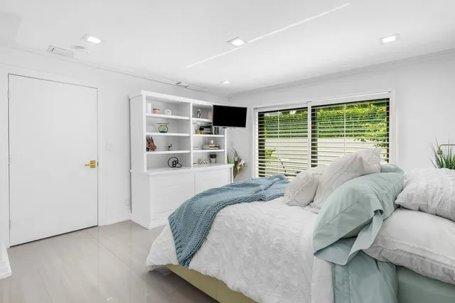 a spacious bathroom with a bathtub and a shower