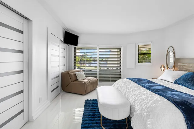 a kitchen with a stove and a potted plant