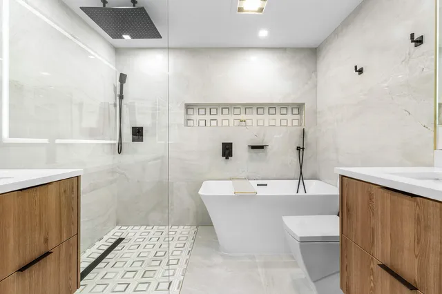 an aerial view of a house with a lake view