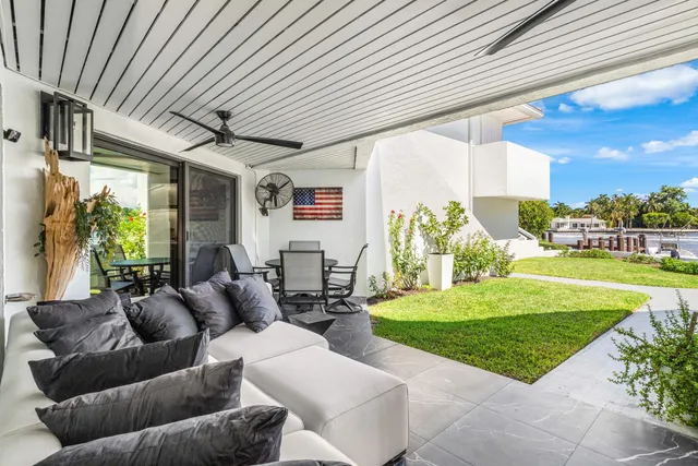 an aerial view of a house with a lake view