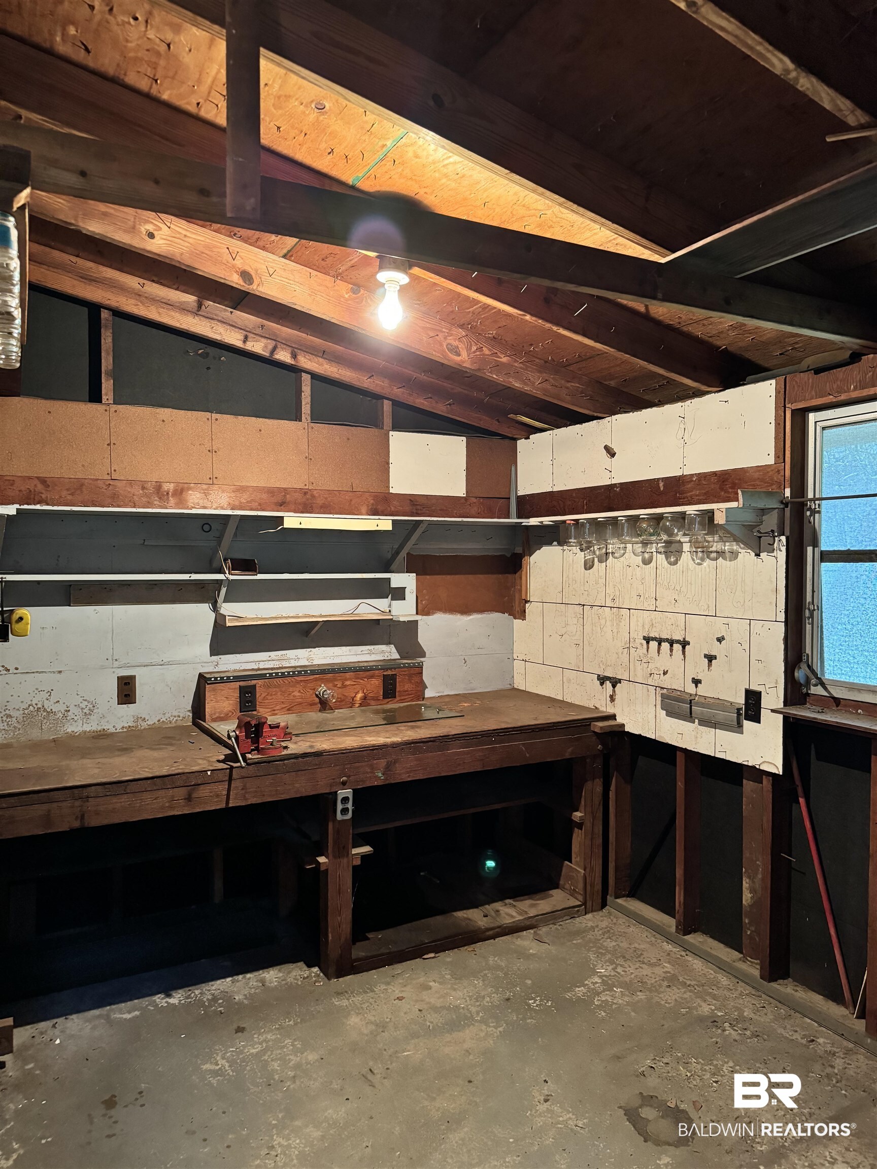 217 West Magnolia Avenue Foley, AL 36535 - Photo 19 of 21 Basement featuring a workshop area