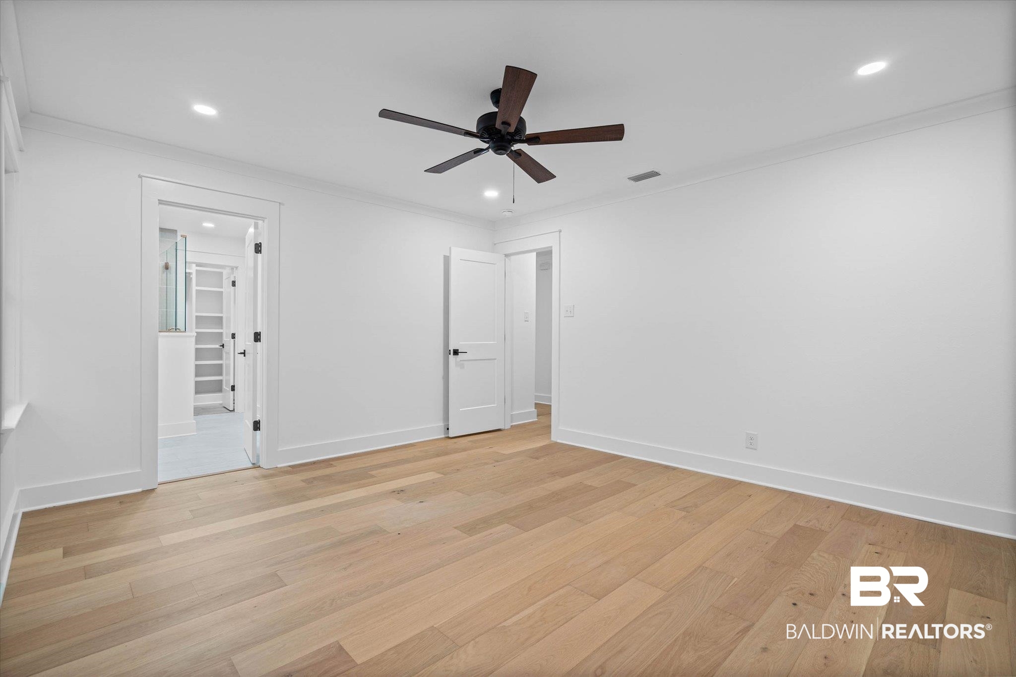 11 Schwaemmle Drive Mobile, AL 36608 - Photo 13 of 32 Unfurnished bedroom featuring recessed lighting, ornamental molding, a ceiling fan, and light wood-style flooring