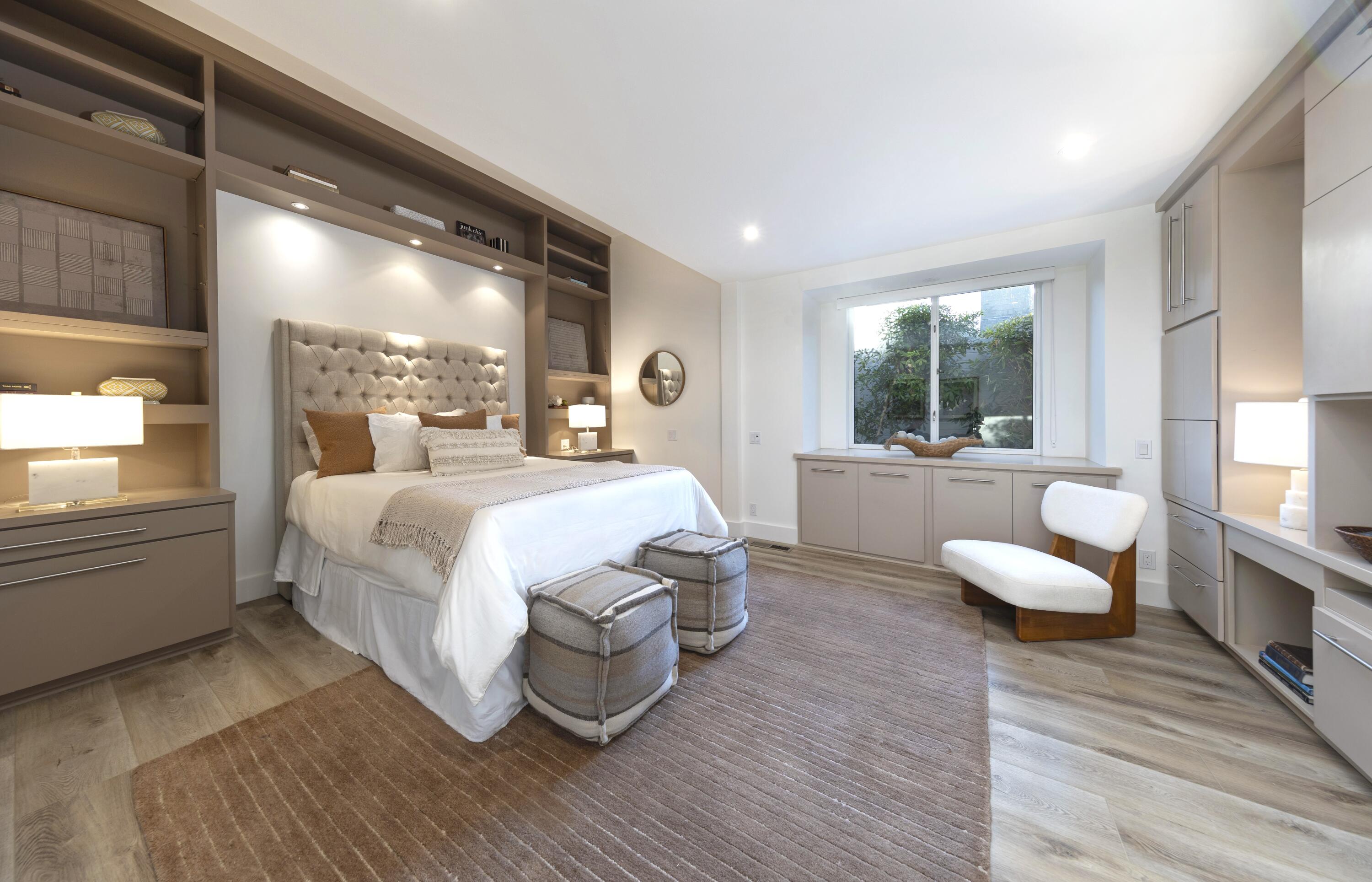 1524 East Valley Road Montecito, CA 93108 - Photo 12 of 19 a bedroom with a bed and wooden floor