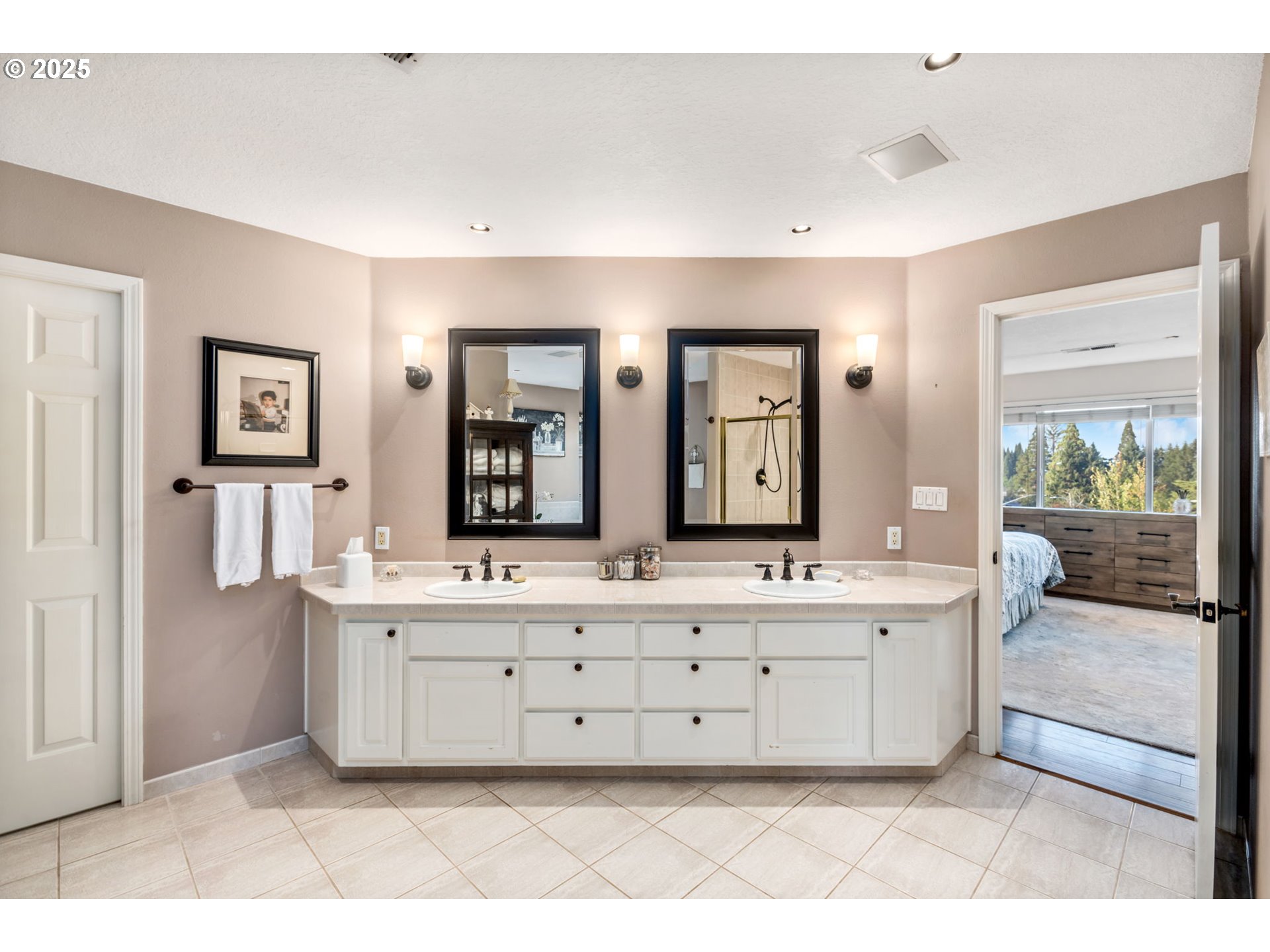 12176 Southwest Ames Lane Portland, OR 97224 - Photo 21 of 46 a bathroom with a double vanity sink mirror and bathtub