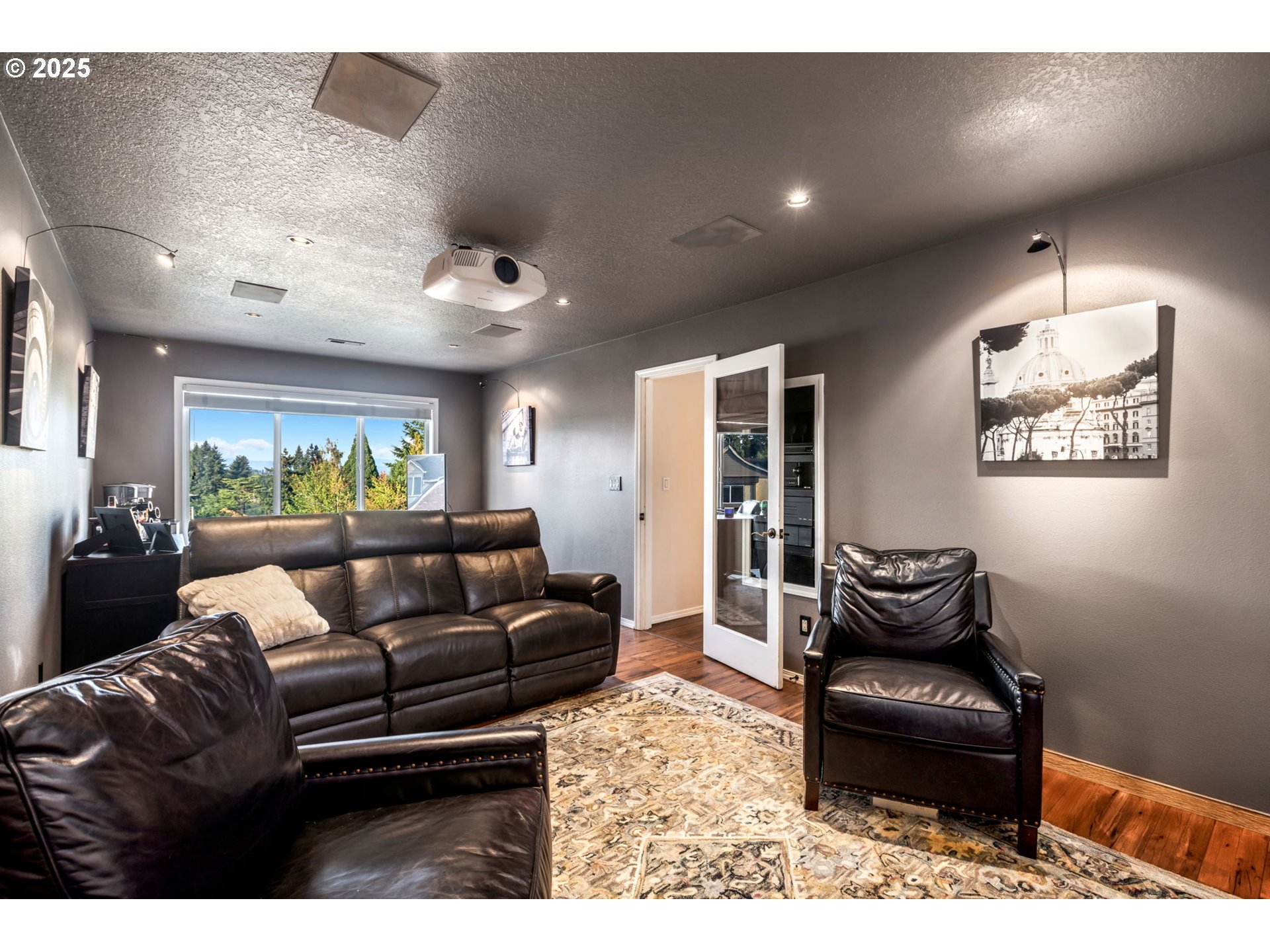 12176 Southwest Ames Lane Portland, OR 97224 - Photo 26 of 46 a living room with furniture and a large window