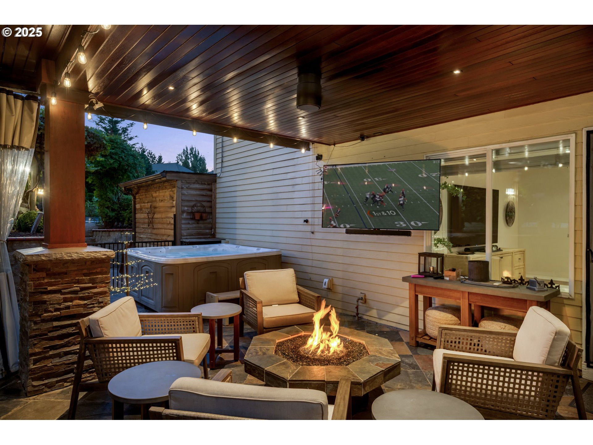 12176 Southwest Ames Lane Portland, OR 97224 - Photo 37 of 46 a view of patio with a table and chairs and potted plants