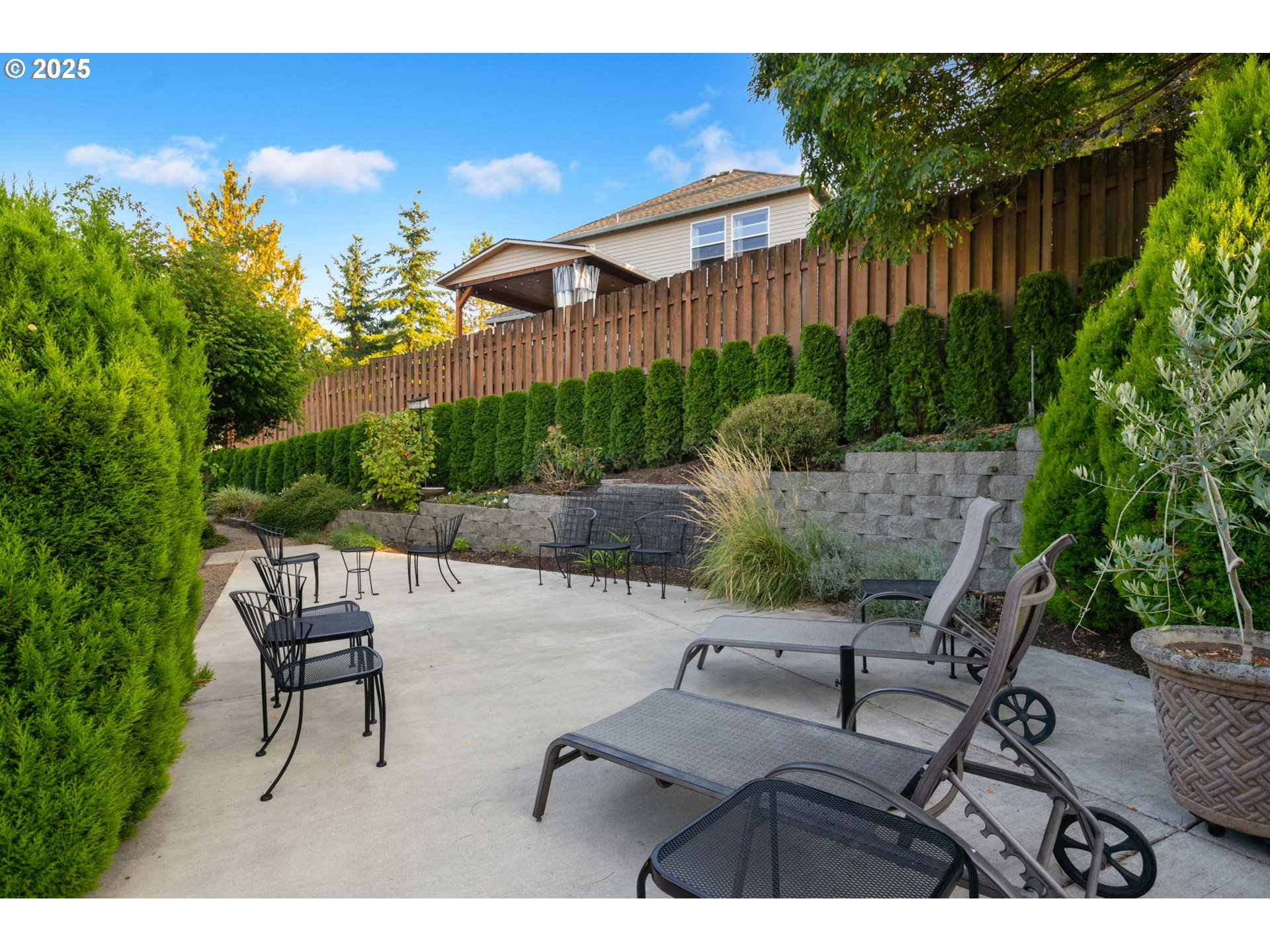 12176 Southwest Ames Lane Portland, OR 97224 - Photo 45 of 46 a view of a backyard with sitting area