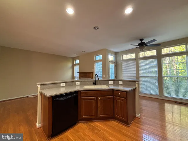 a kitchen with a stove and a sink