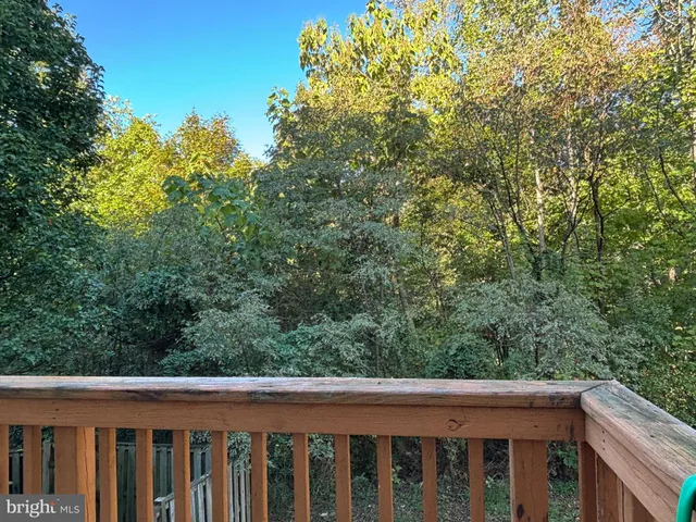 a balcony with an outdoor space