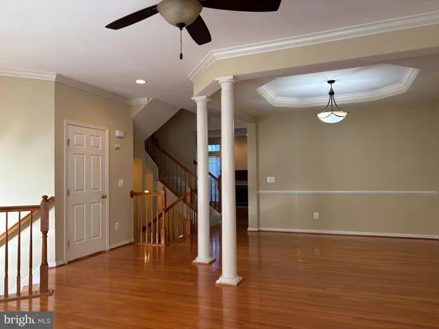 a view of entryway with wooden floor