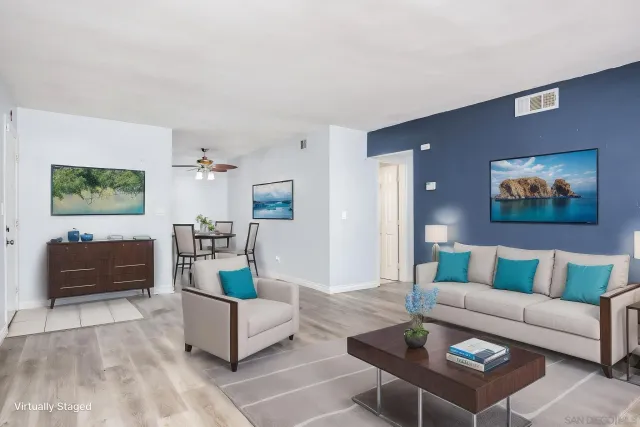 a living room with furniture and a couch