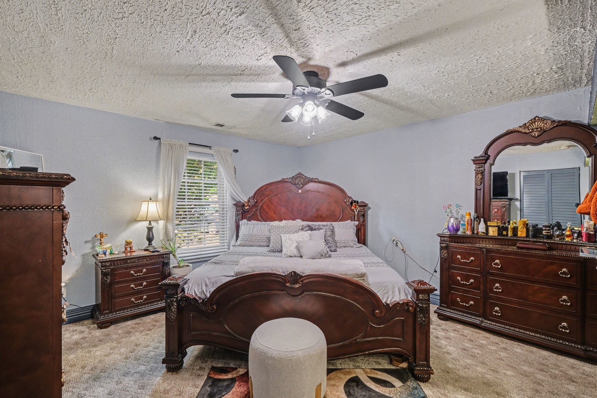 206 McKaig Road Murfreesboro, TN 37127 - Photo 12 of 36 a bedroom with a bed and a chandelier