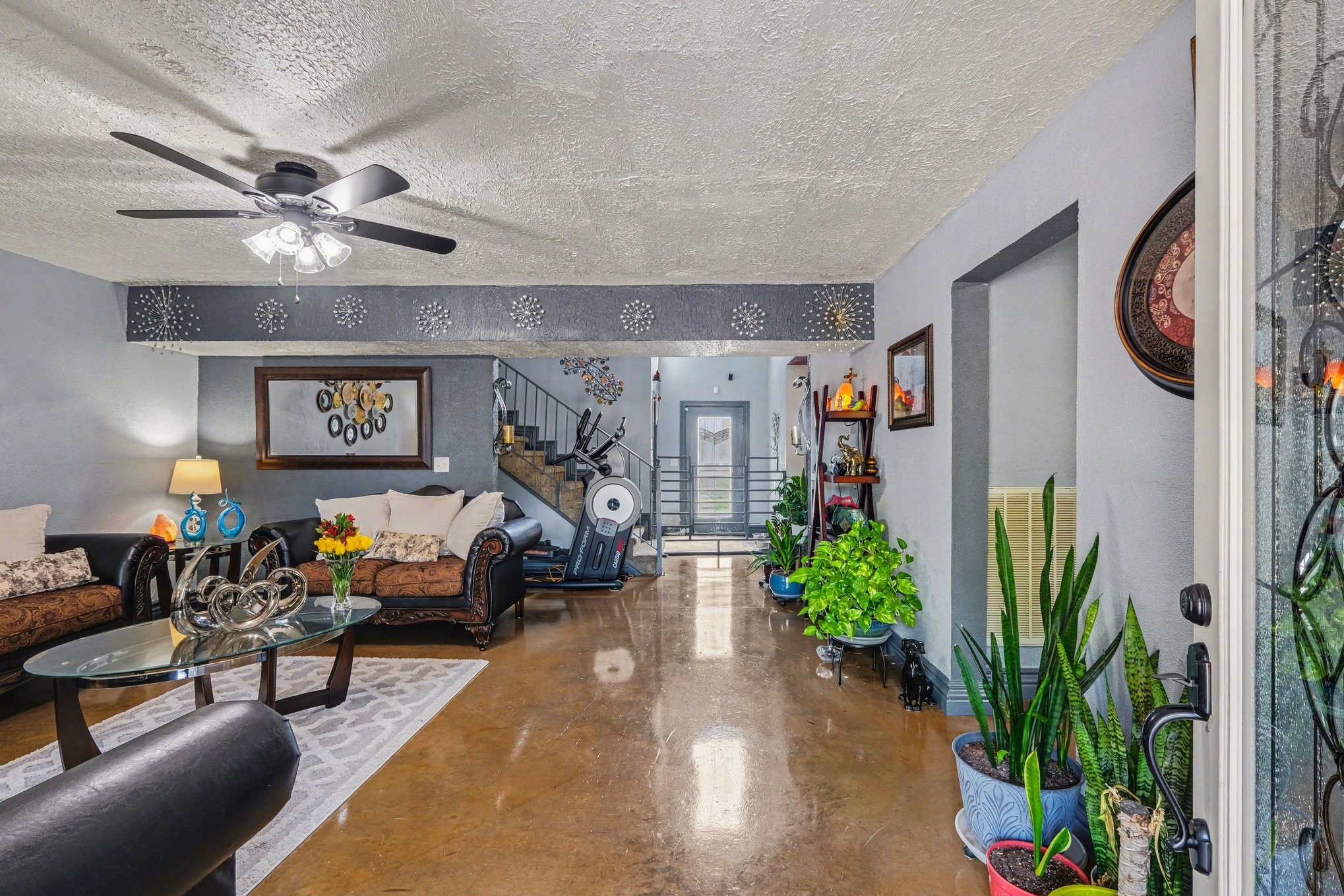 206 McKaig Road Murfreesboro, TN 37127 - Photo 2 of 36 a living room with furniture and a chandelier