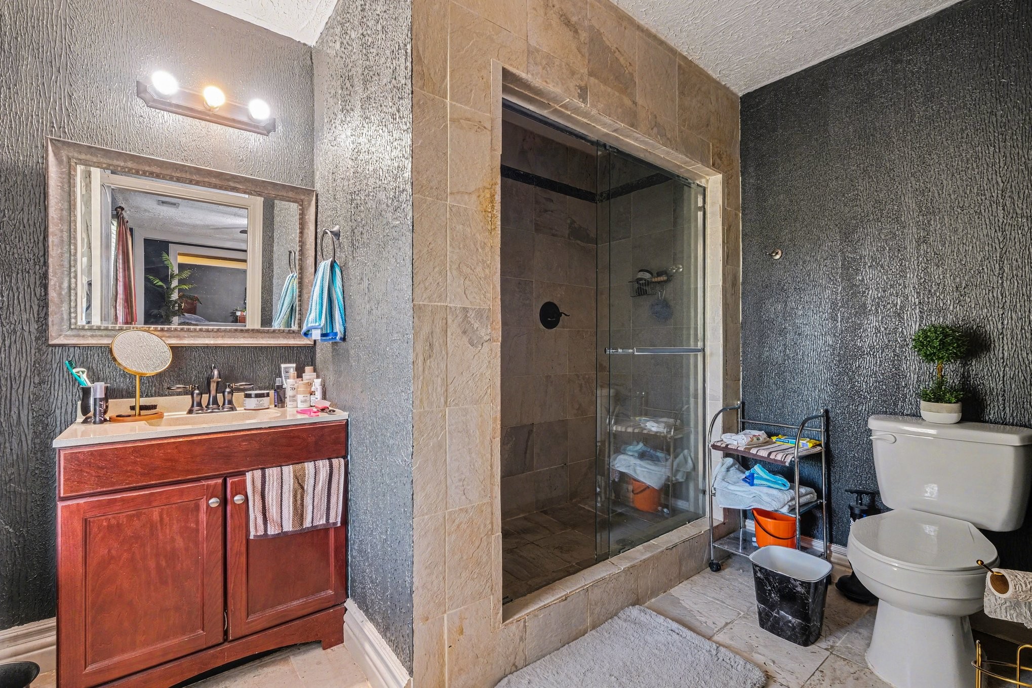 206 McKaig Road Murfreesboro, TN 37127 - Photo 25 of 36 a bathroom with a toilet a sink and shower