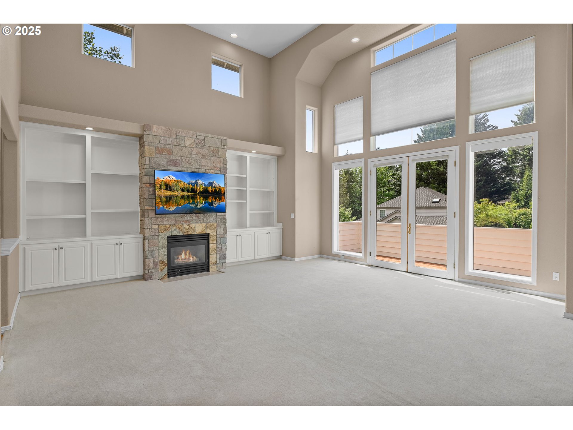 1318 Northwest Slocum Way Portland, OR 97229 - Photo 11 of 33 a view of an empty room with a fireplace and a window