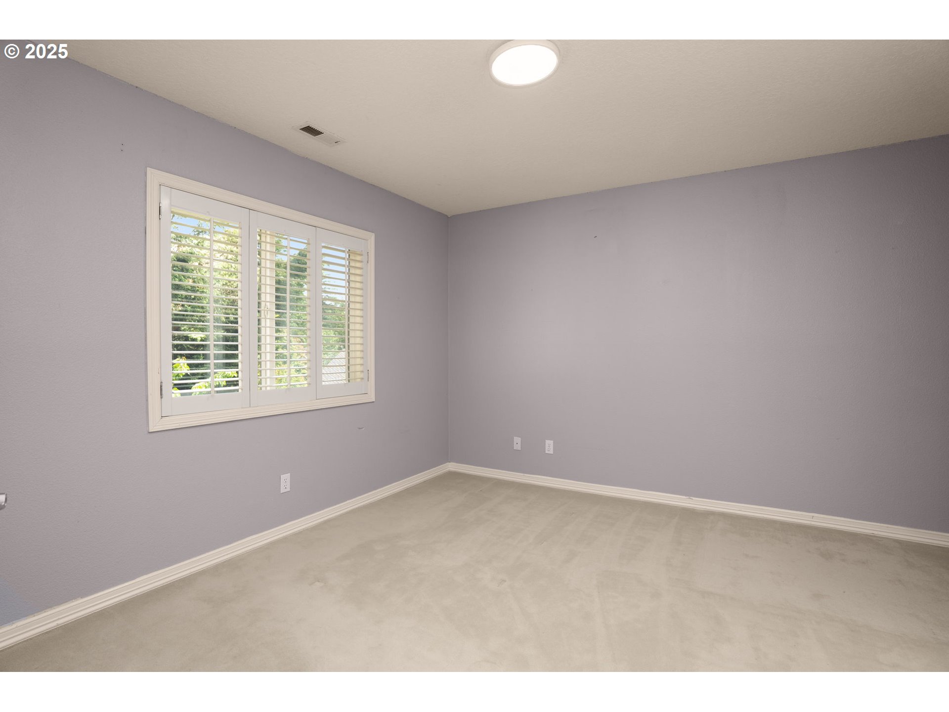 1318 Northwest Slocum Way Portland, OR 97229 - Photo 25 of 33 an empty room with windows