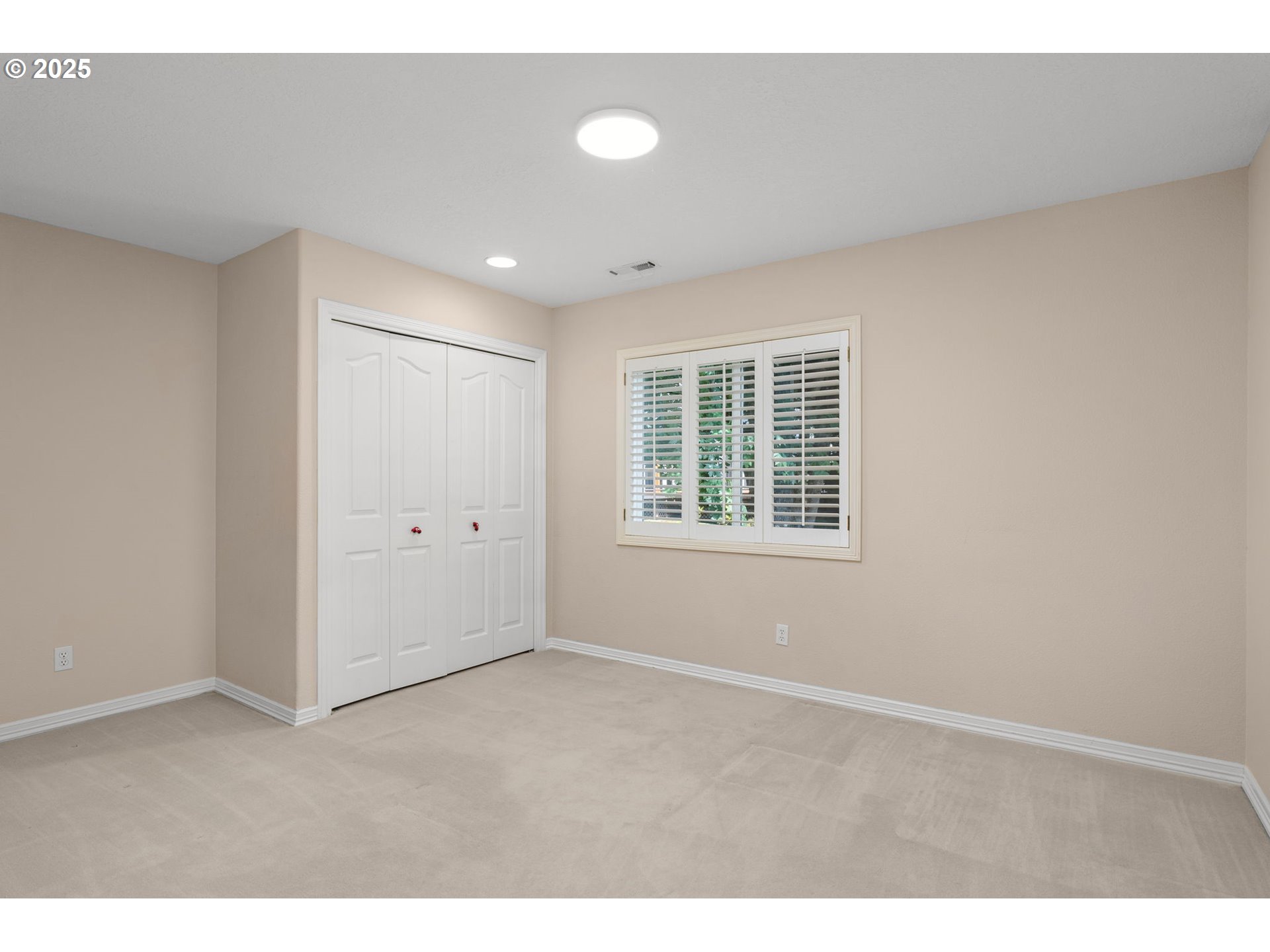 1318 Northwest Slocum Way Portland, OR 97229 - Photo 26 of 33 a view of an empty room with a window