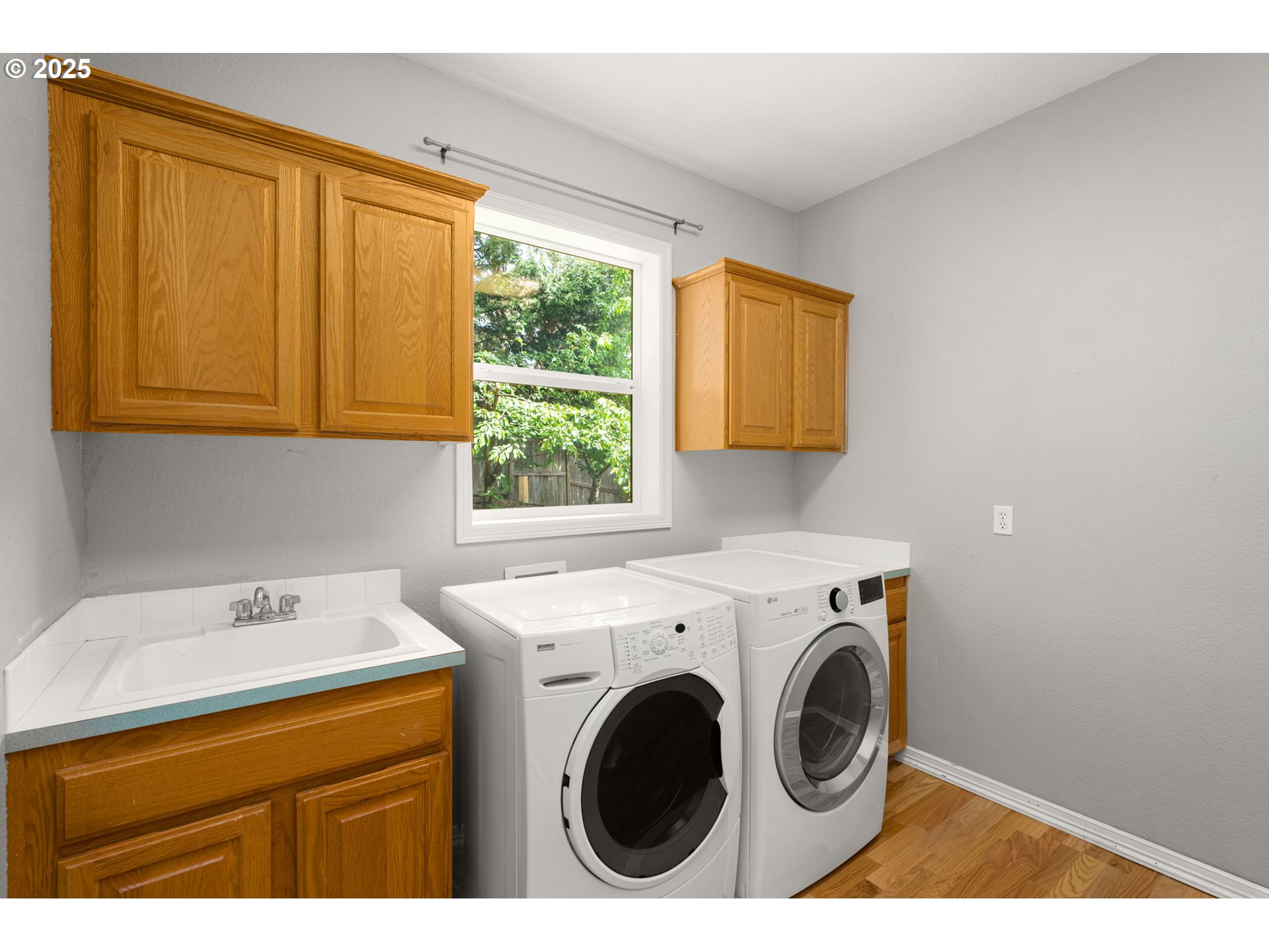 1318 Northwest Slocum Way Portland, OR 97229 - Photo 27 of 33 a utility room with dryer and washer