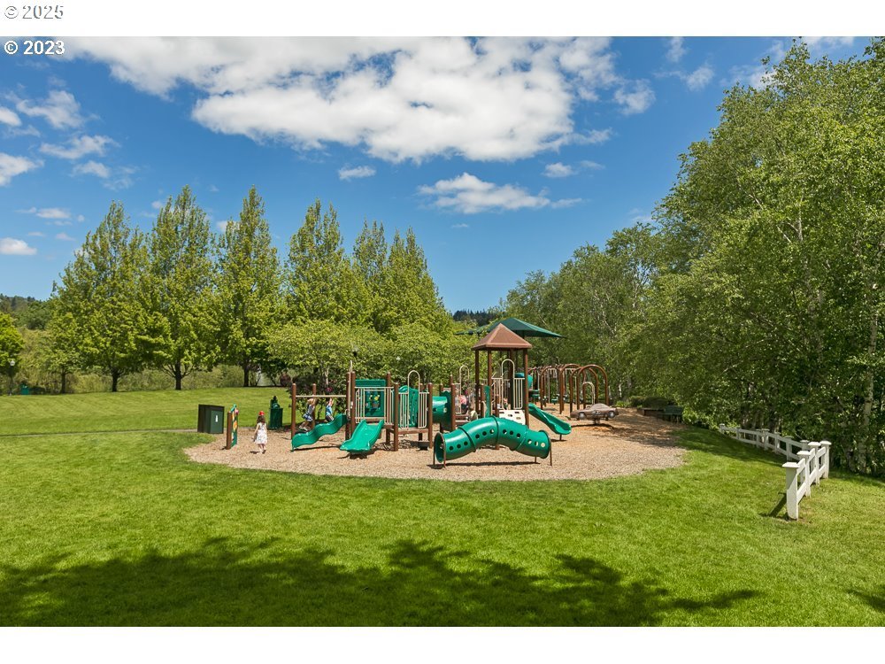1318 Northwest Slocum Way Portland, OR 97229 - Photo 31 of 33 a view of a park with swings and slides