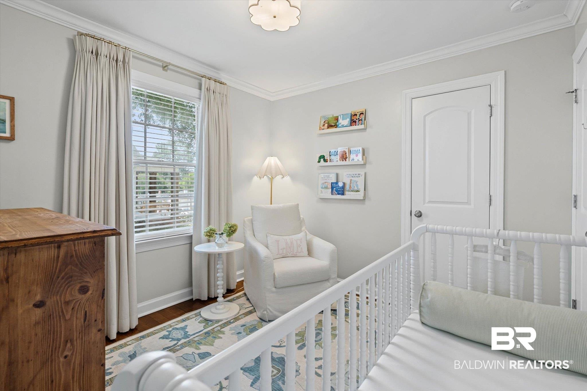 77 North Hathaway Road Mobile, AL 36608 - Photo 24 of 33 Bedroom with ornamental molding, wood finished floors, and a crib