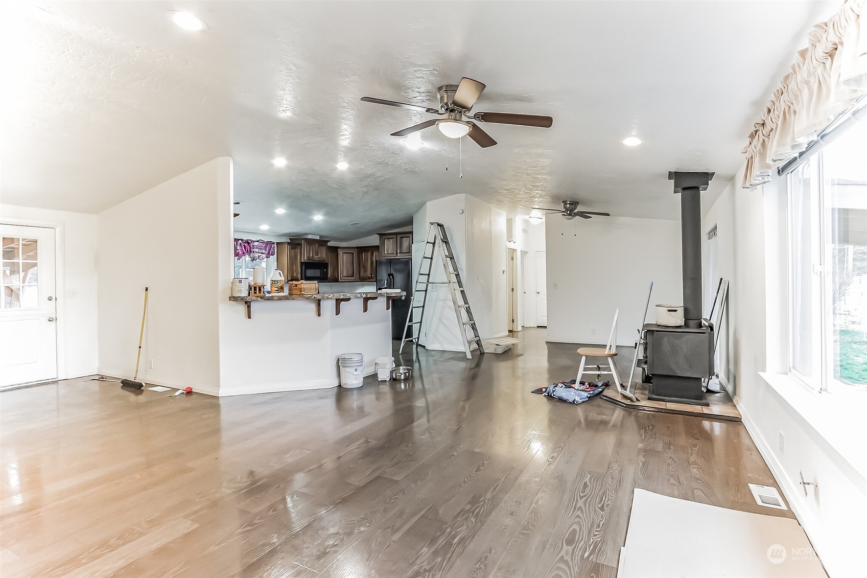 18222 Guava Street Southwest Rochester, WA 98579 - Photo 3 of 13 a view of a living room and a floor to ceiling window